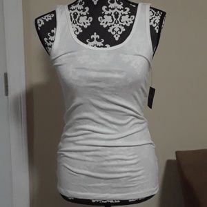 Bright-white top. New with tags. Size M